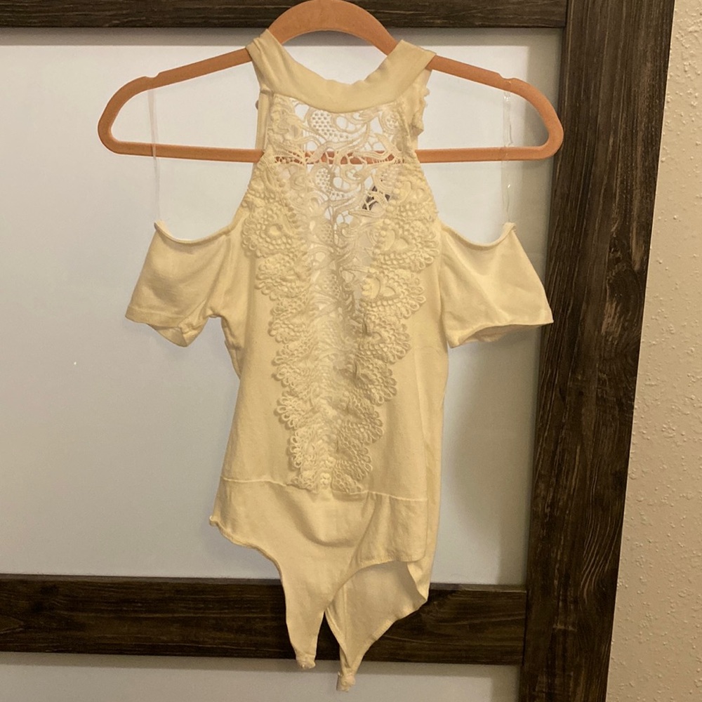 White body suit. NEVER BEEN WORN.